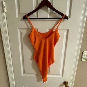 ORANGE BODYSUIT